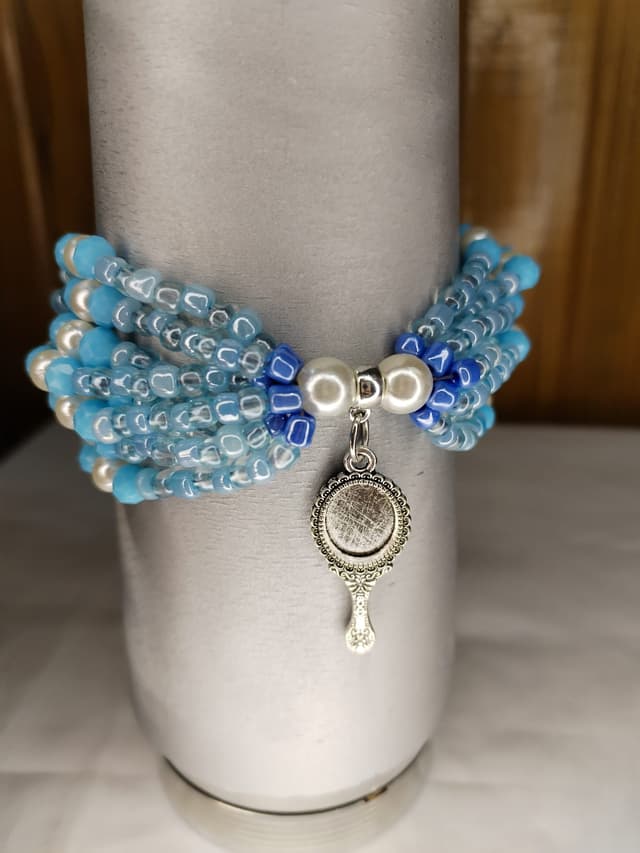thumbnail of Pulseras 8 hilos Iemanja con dijes